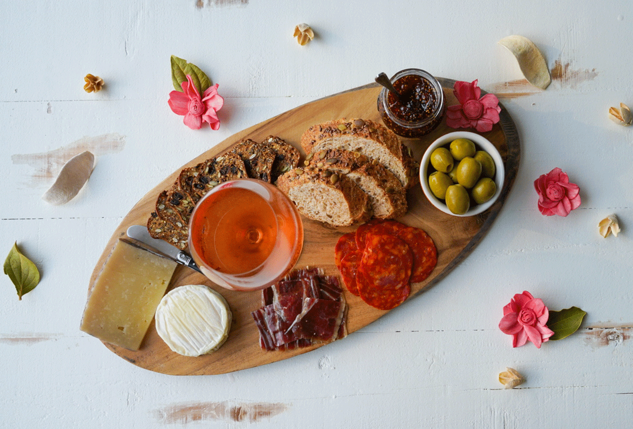 Spanish Rosé (Rosado) Wine Placed on Cheese and Charcuterie Board