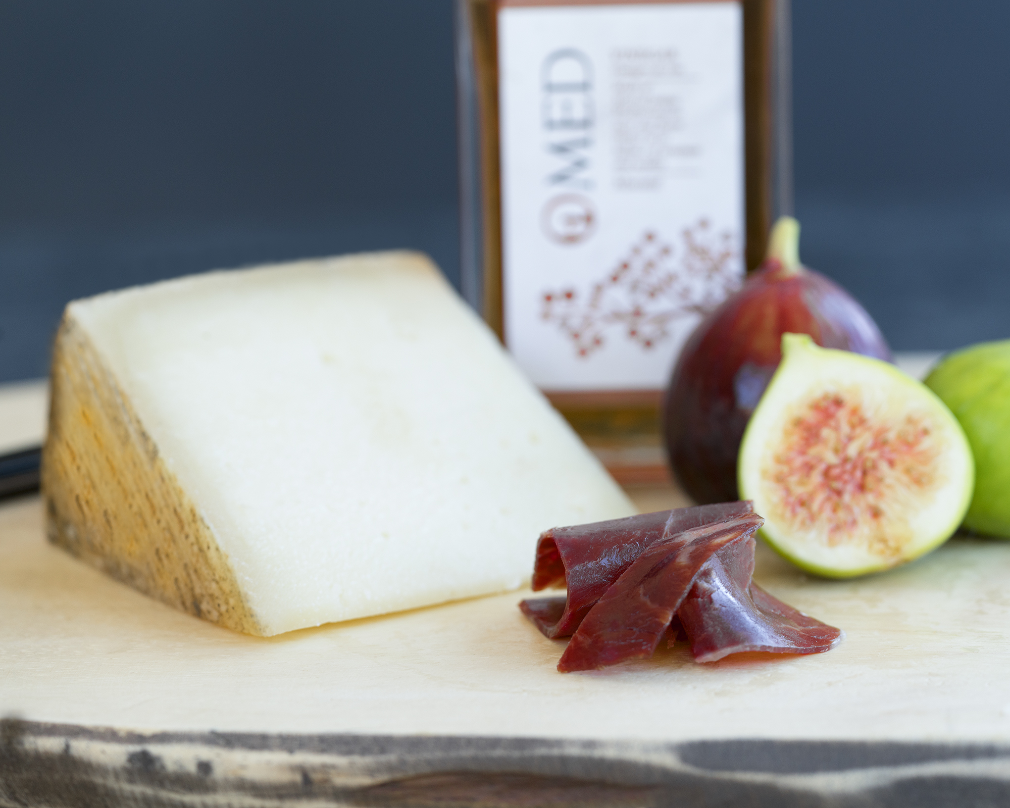 Figs Manchego Cheese Ramón Ibérico Salad Ingredients Pictured on Cutting Board