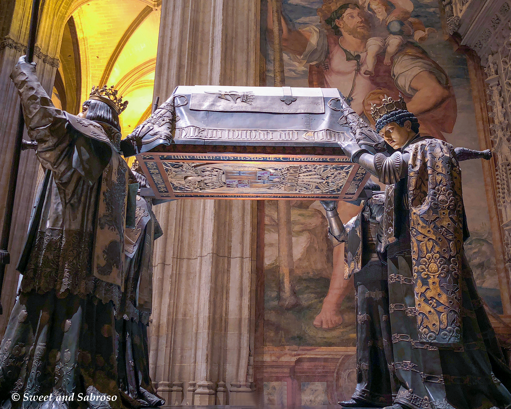 Tomb of Christopher Columbus held by four figures representing the kingdoms of Spain