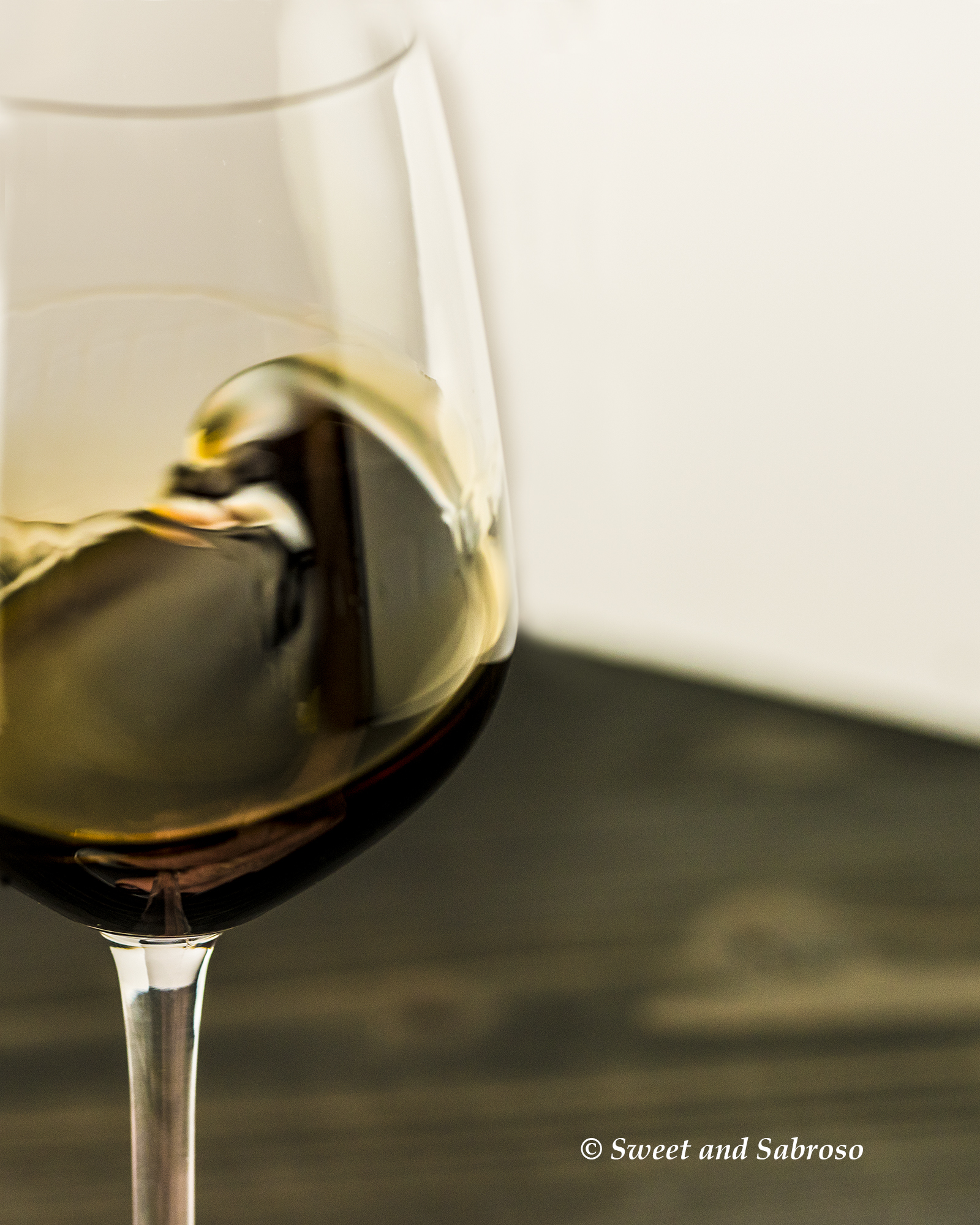 Pedro-Ximenex-PX-Sherry-Wine-Swirling-Wine-In-Glass