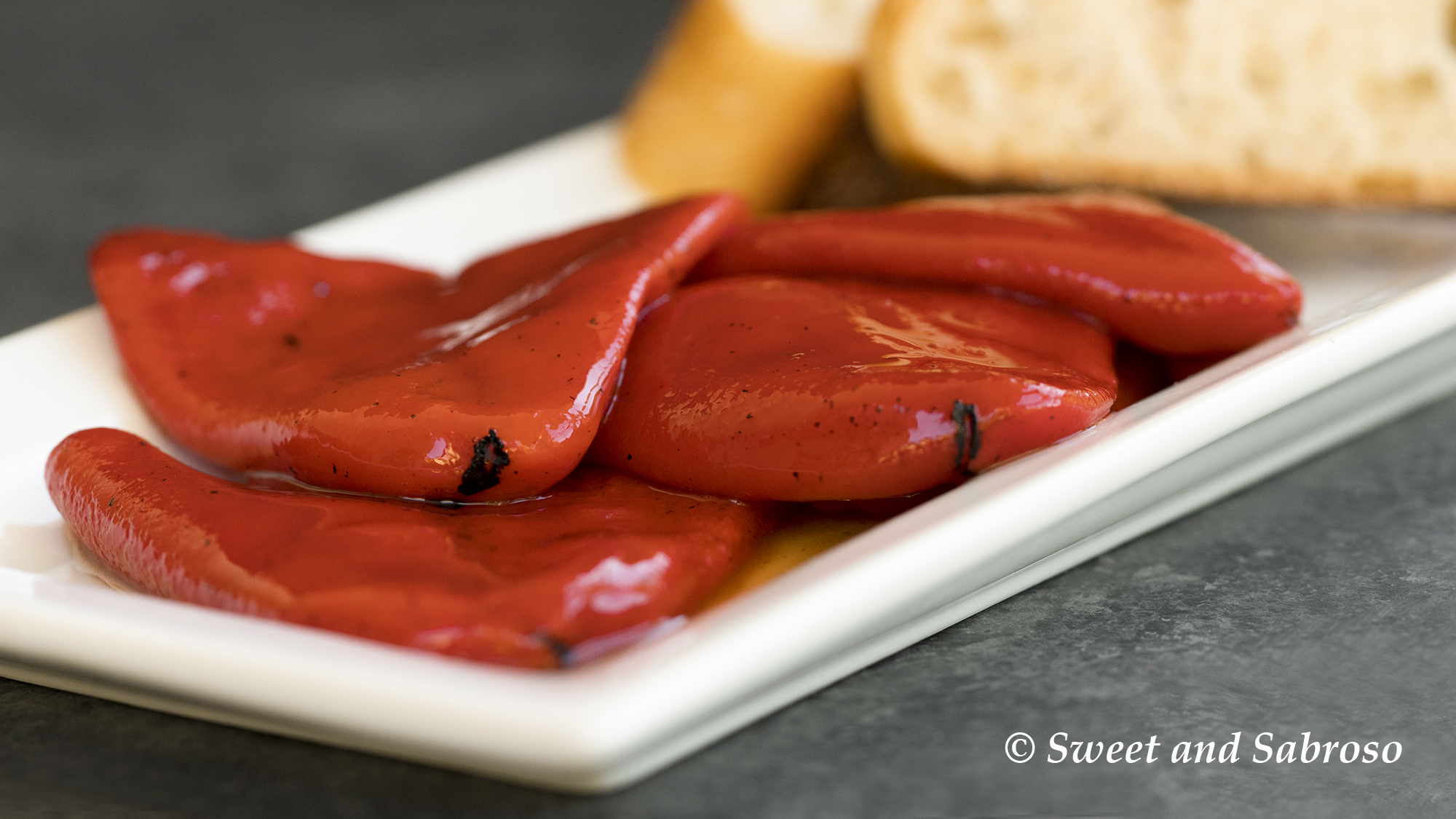 Piquillo Peppers from Spain with crusty bread served on a platter