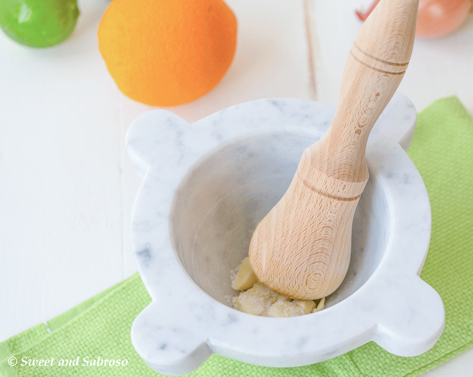 Mortar and Pestle with Garlic for Cuban Mojo Sauce